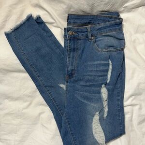Distressed Mid-Blue Skinny Jeans with Frayed Hem